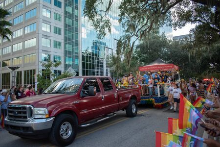 Orlando, Florida. October 12, 2019. Thebarberrfund.org chariot in Come Out With Pride Orlando parade at Lake Eola Park area 256のeditorial素材