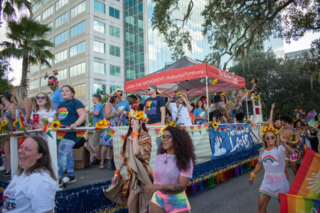 Orlando, Florida. October 12, 2019. Thebarberrfund.org chariot in Come Out With Pride Orlando parade...