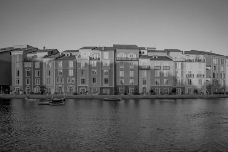 Orlando, Florida. May 21, 2019. Beautiful Italian Portofino hotel, with colorful villages and fishing boats in little bay harbor at Universal Studios areaのeditorial素材