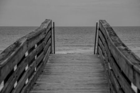 Ponce de Leon Inlet, Florida. July 19, 2019 Small boardwalk and green see at lighthouse areaのeditorial素材