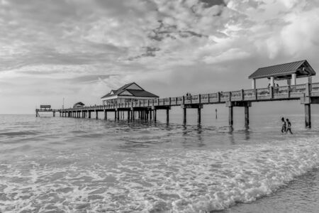 Clearwater Beach, Florida February 28, 2019 Panoramic view of Pier 60 on lightblue cloudy background in Gulf Coast Beaches 2のeditorial素材