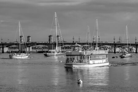 St. Augustine, Florida January 26, 2019. Scenic Cruise Tour, sailboats and Bridge of Lions on colorful background in Floridas Historic Coastのeditorial素材