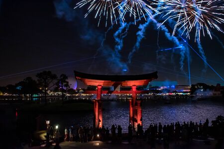Orlando, Florida. November 01, 2019. Japanese arch and spectacular fireworks at night background in Epcot (76)のeditorial素材