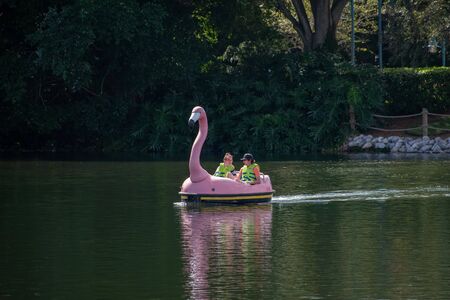 Orlando, Florida. October 29, 2019. People enjoying swan boat ride at Seaworldのeditorial素材