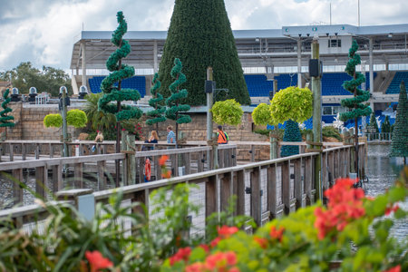 Orlando, Florida. November 06, 2019. Beautiful view of flowers, Christmas trees, bridge and Bayside Stadium at Seaworldのeditorial素材