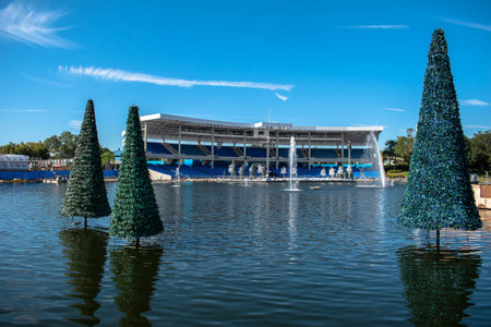 Orlando, Florida . November 22, 2019. Partial view of Bayside Stadium and Christmas trees on lake at...