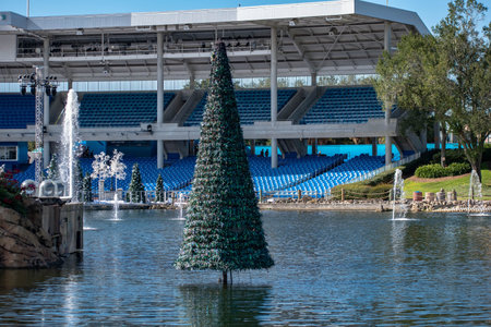 Orlando, Florida . November 22, 2019. Partial view of Bayside Stadium and Christmas trees on lake at...