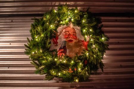 Orlando, Florida. November 23, 2019. Vintage Santa Claus mural and ornaments at Seaworlds Christmas Celebration.のeditorial素材