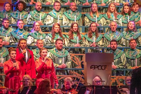 Orlando, Florida. December 06, 2019. Heavenly choir and orchestra in Candlelight Narrators at Epcot (2)のeditorial素材