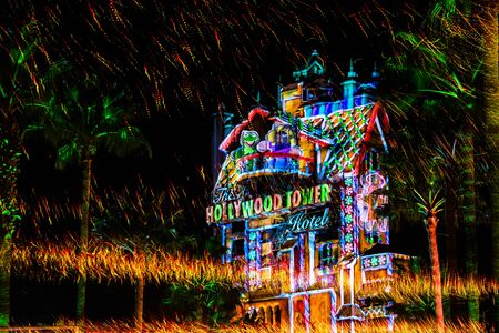 Orlando, Florida. November 27, 2019 Colorful projections on The Hollywood Tower Hotel with artificial snow at Hollywood Studios (18)のeditorial素材