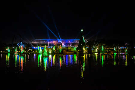 Orlando, Florida. December 30, 2019. Illuminated and colorful Sea of Christmas Trees with light rays on background at Seaworld 14のeditorial素材