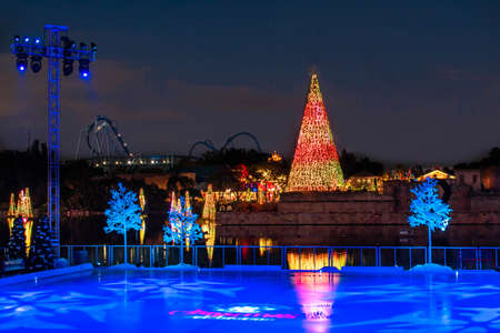 Orlando, Florida. November 27, 2020. Panoramic view of colorful big Christmas Three at night in Seaworld. (27)のeditorial素材