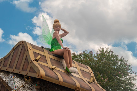 Orlando, Florida. August 04, 2020. Tinker Bell on beautiful parade float at Magic Kingdom (356)