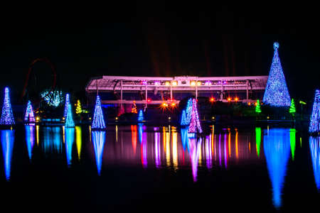 Orlando, Florida. December 30, 2020. Colorful Christmas trees on lake at Seaworld (6)のeditorial素材