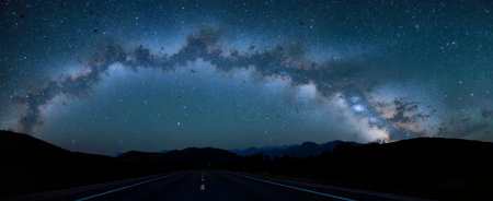 Milky Way over the road at night. Long exposure photograph.の素材