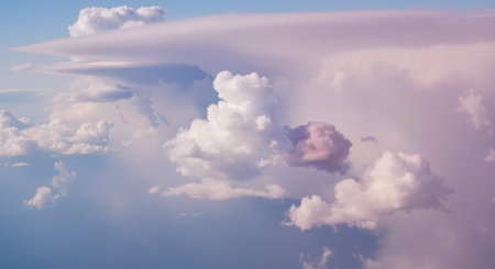 Aerial view of beautiful fluffy clouds in the blue sky. 3d illustrationの素材