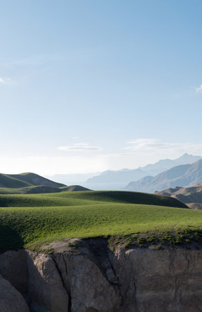 Landscape of grassland with mountains in the background, New Zealandの素材