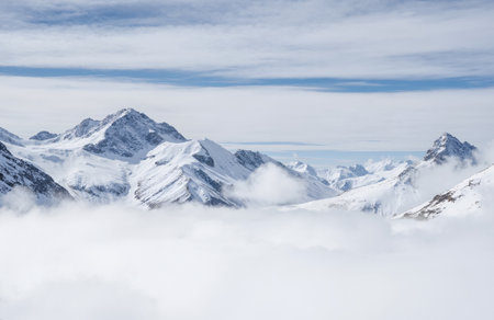 Mountain landscape with clouds and blue sky, Caucasus Mountains, Georgiaの素材