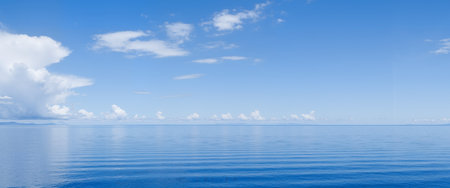 Blue sky with clouds and sea. Panoramic view. Seascape.の素材
