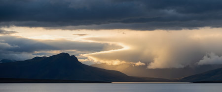 Panoramic view of the mountains in Iceland. Dramatic sunset sky.の素材