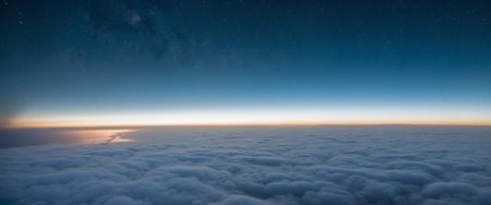 Beautiful view above the clouds at dawn. Panoramic view over the clouds.の素材