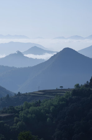 Mountain landscape with fog and clouds in the morning, South Koreaの素材