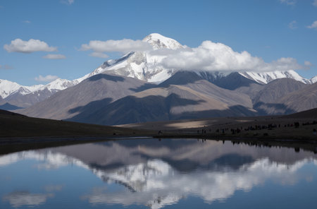 Mountain landscape with lake and reflection in Pamir, Tajikistanの素材