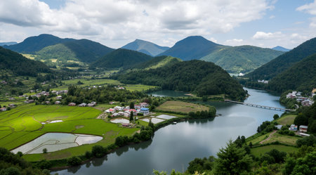 Panoramic view of the lake and the village in the mountainsの素材