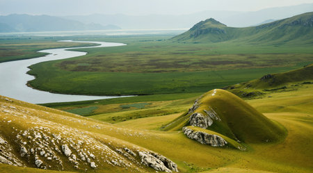 Mountain landscape with lake and grassland in Tibet, China.の素材
