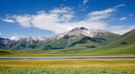 Mountain landscape with grassland and lake, Kyrgyzstanの素材
