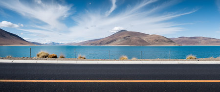 Highway in the mountains with blue sky and white clouds, Panoramic viewの素材
