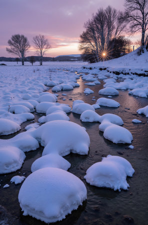 Sunset over the frozen river in winter, Bavaria, Germanyの素材