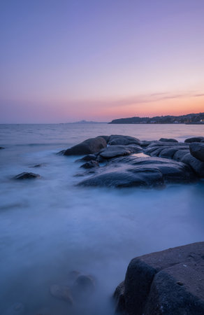 Long exposure of the sea and rock at sunset. Soft focus.の素材