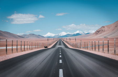 Highway in the desert with blue sky and white clouds background.の素材