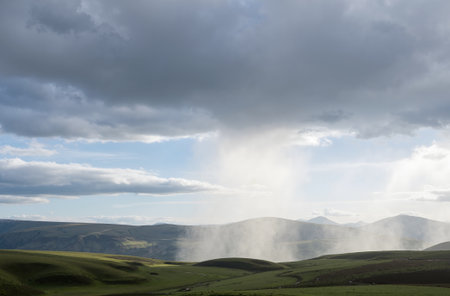 Clouds over the grassland in the Yorkshire Dales National Parkの素材