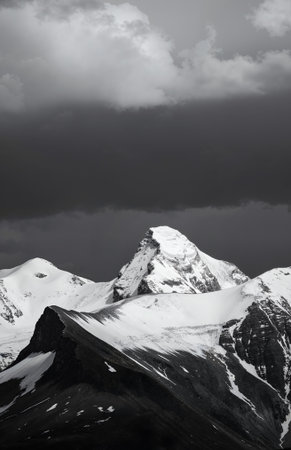 Black and white image of snow capped mountains in Cordillera Blancaの素材