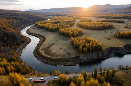 Aerial view of river and forest at sunset. Beautiful autumn landscapeの素材