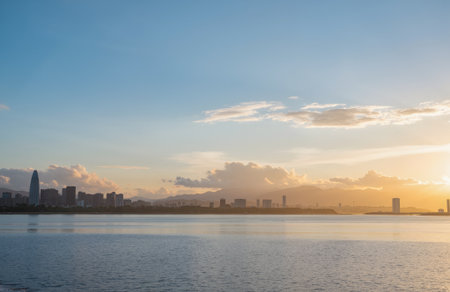 Sunset over the sea and the city skyline in Shenzhen, Chinaの素材