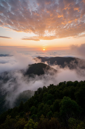 Beautiful sunrise in the mountains with fog and clouds in the morningの素材
