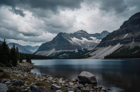 Bow Lake in Banff National Park, Alberta, Canada. The lake is surrounded by mountains.の素材