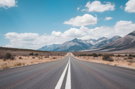 Asphalt road with blue sky in the desert, California, USAの素材