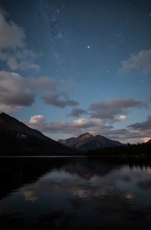 Mountain lake at night with stars and milky way, Canadaの素材