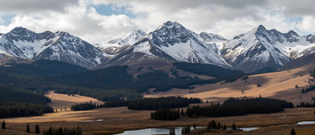 Panoramic view of snowy mountains and lake in Alberta, Canadaの素材
