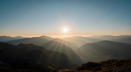 Sunrise in the mountains of the Caucasus. View from the top of the mountain.の素材