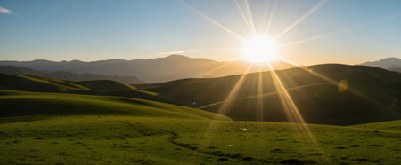 Sunset over rolling hills in South Island, New Zealand. Panorama.の素材