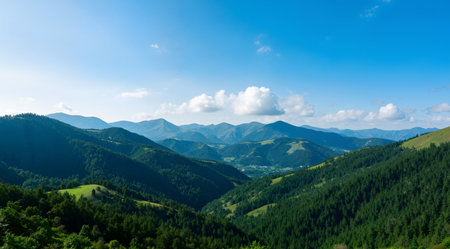 beautiful mountain landscape with green hills and blue sky in the backgroundの素材