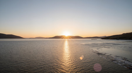 Sunset over a fjord in the north of Norway.の素材