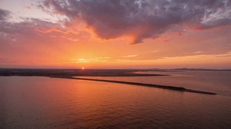 Aerial view of beautiful sunset over the sea and the island.の素材