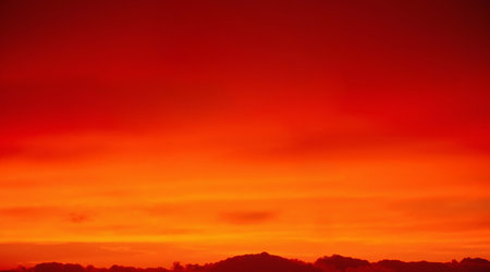 Beautiful sunset with orange and red colors on the sky background.の素材