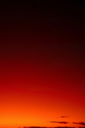 Beautiful red sunset in the sky. Colorful sky background.の素材